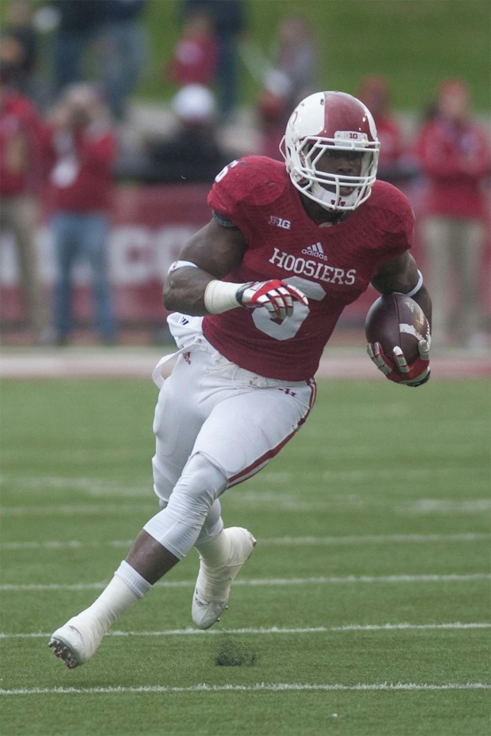 Then sophomore running back Tevin Coleman runs the ball against Minnesota on Nov. 2, 2013 at Memorial Stadium.
