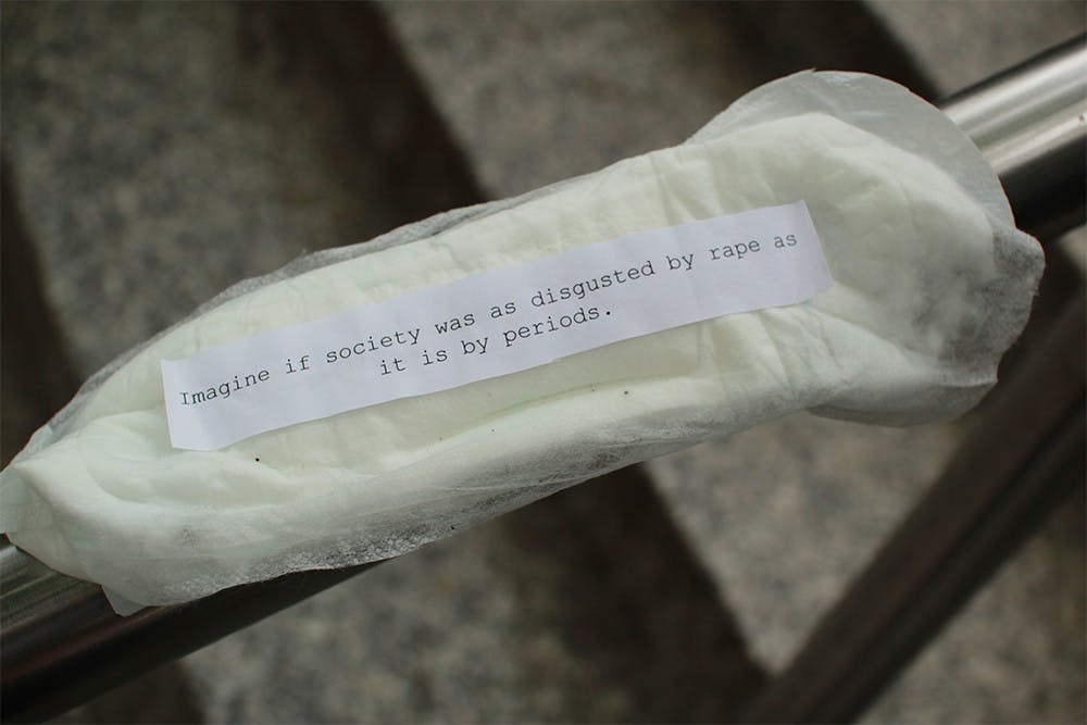 Activists posted sanitary napkins across campus as part of the global #PadsAgainstSexism initiative. Each pad was emblazoned with a feminist message or statistic about sexual assault from RAINN or the Human Rights Campaign.