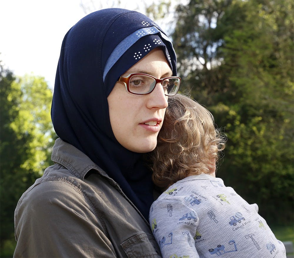 Anna Maidi talks about her experience since she has converted as a muslim Thursday at Sotuheast Park. When Maidi was a freshman at IU, she met her now husband, Chabane. Maidi was introduced to Islam by Chabane and fully converted as a muslim during her study abroad trip in France three years later. She has two children and in active in local Islamic community. 