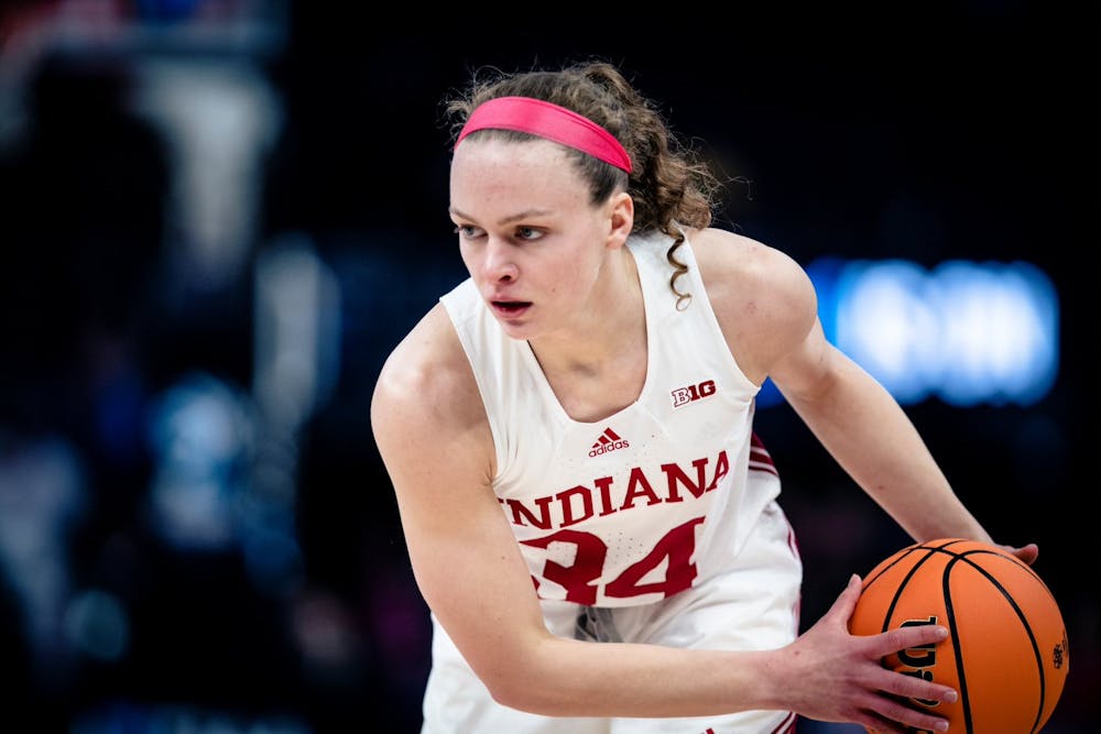 <p>Senior guard Grace Berger holds the ball March 4, 2023, at the Target Center in Minneapolis, Minnesota. Ohio State defeated Indiana 79-75.</p>