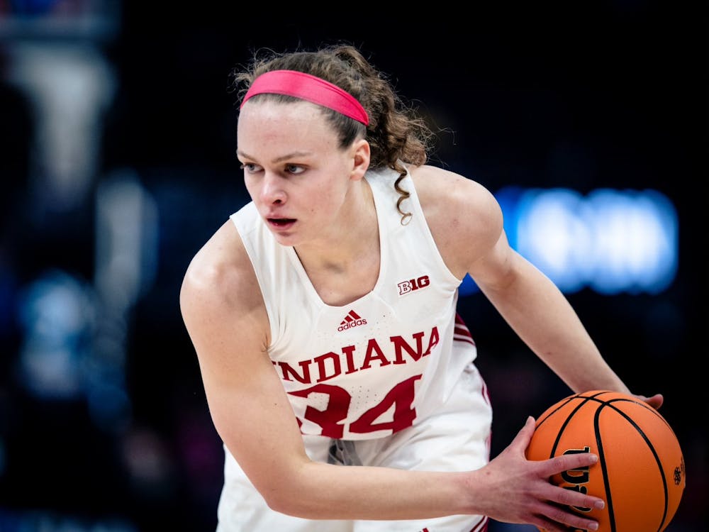 Senior guard Grace Berger holds the ball March 4, 2023, at the Target Center in Minneapolis, Minnesota. Ohio State defeated Indiana 79-75.