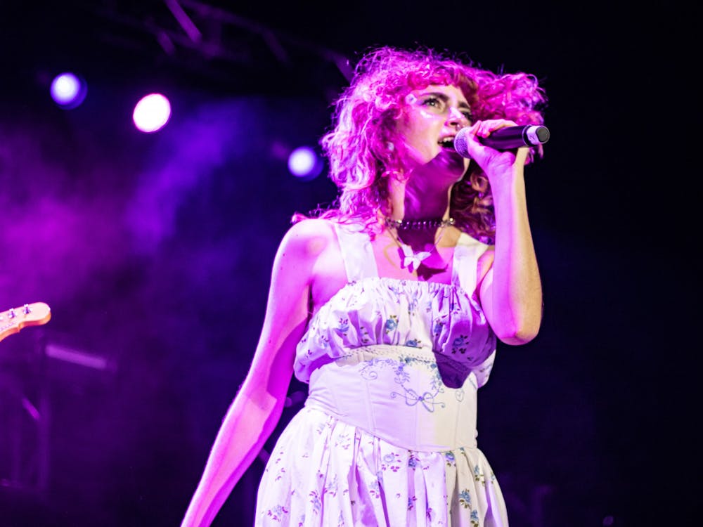 IU junior and Manic Pixie singer Maggie Zielinski performs at the 2021 IU Welcome Week Block Party on Aug. 21. Local artists and art houses are adjusting to performing and operating as COVID-19 restrictions become looser.