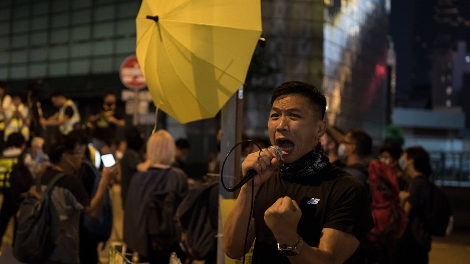 A protester shouts various slogans during a demonstration in Hong Kong. Demonstrators gathered for an anti-authoritarian rally that marked the fifth anniversary of the beginning of the 2014 &quot;Umbrella Movement.&quot; Thousands of protesters gathered peacefully, but minor clashes between protesters and police escalated through the night, leading to a police dispersal operation.