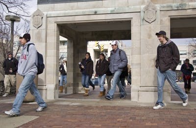 Students walk to class Monday morning outside the Arboretum. IU faculty say walking puts students at less risk for health problems.