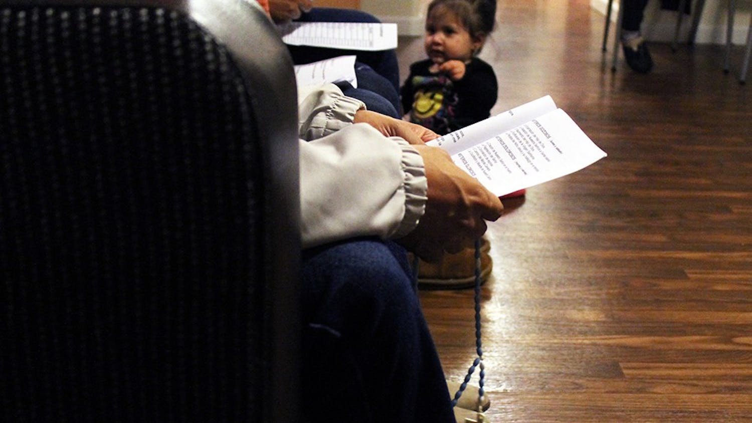 With rosary in hand, Luis Mora prays during a rosary novena on the west side of Bloomington. Rosary novenas were held nightly for 27 days prior to the Day of the Virgin of Guadalupe Dec. 12.