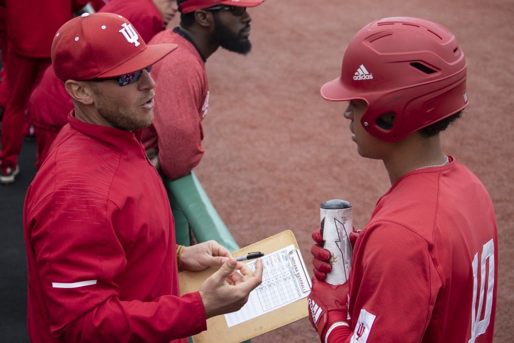 <p>Sophomore infielder Justin Walker talks to Head Coach Jeff Mercer on Sunday, April 28 at Bart Kaufman Field. Walker struck out swinging at the bottom of the first inning. </p>