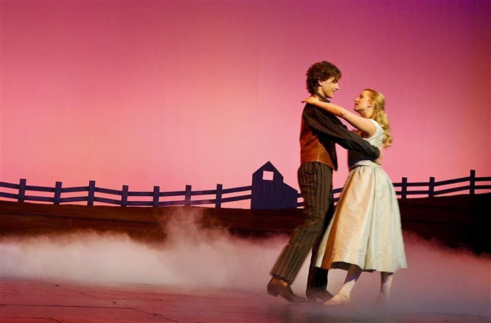 Students of the Department of Theater and Drama perform the dress rehearsal of the classic musical "Oklahoma" on Monday evening at the Lee Norvell Theatre. Junior, Mark Banik and Kerry Ipema perform as Curly and Laurie. 