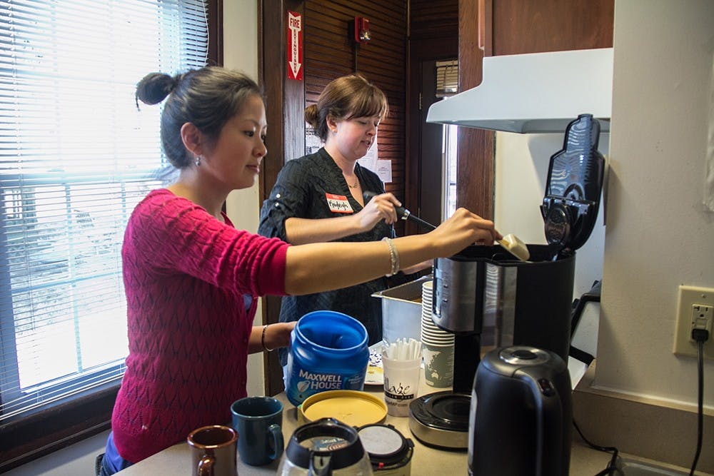 The Asian Cultural Center have their open house on Thursday from 2-5 p.m. Sarah (front) and Kayleigh(back) make coffee and soup for students who come to Asian Cultural Center today.
