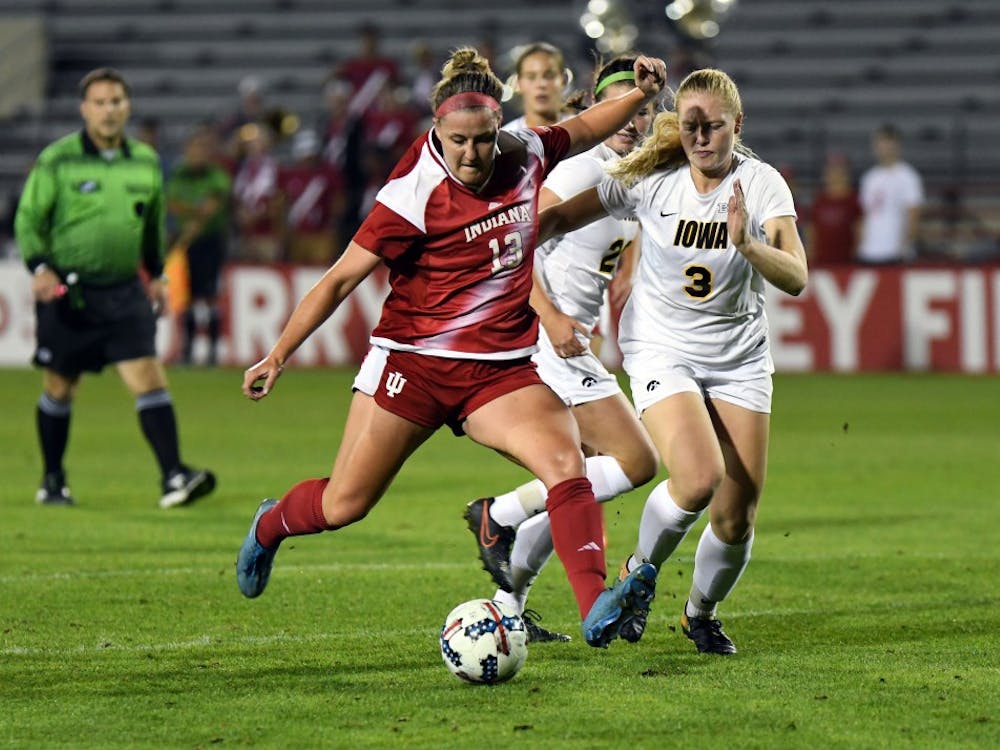 Junior forward Maya Piper scores a goal in the first half against Iowa on Thursday evening at Bill Armstrong Stadium. IU defeated Iowa, 2-1, to earn its second Big Ten win of the season.