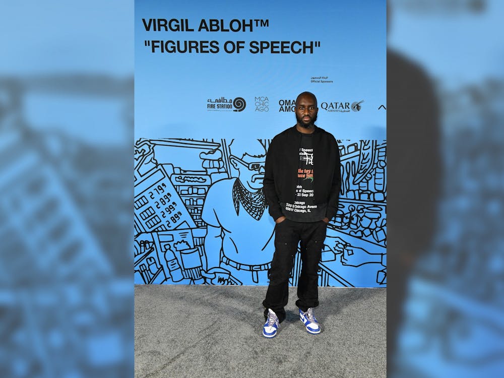 Virgil Abloh attends the opening of his exhibition “Figures of Speech” on Nov. 4, 2021, at the Fire Station in Doha, Qatar.