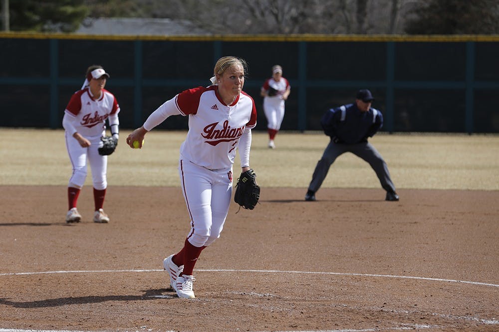 Senior Pitcher Lora Olson winds up for a pitch during IU's game against Rutgers Sunday at the Andy Mohr Field. IU lost 6-10. 