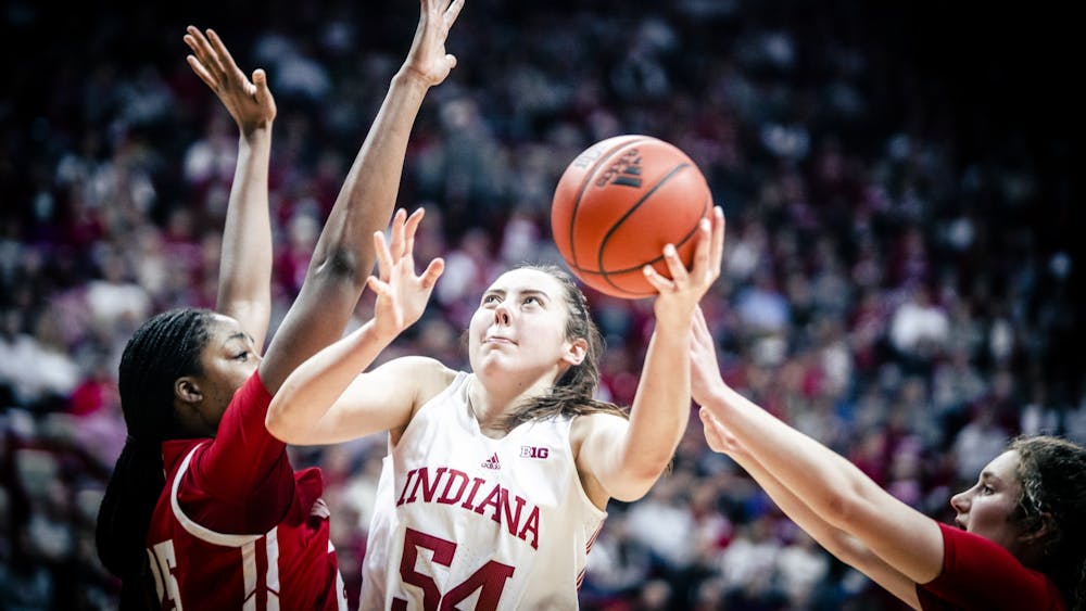 Senior forward MacKenzie Holmes puts up a shot Jan. 15, 2023 at Simon Skjodt Assembly Hall in Bloomington, Indiana. The Hoosiers beat Illinois 83-72 Wednesday night.