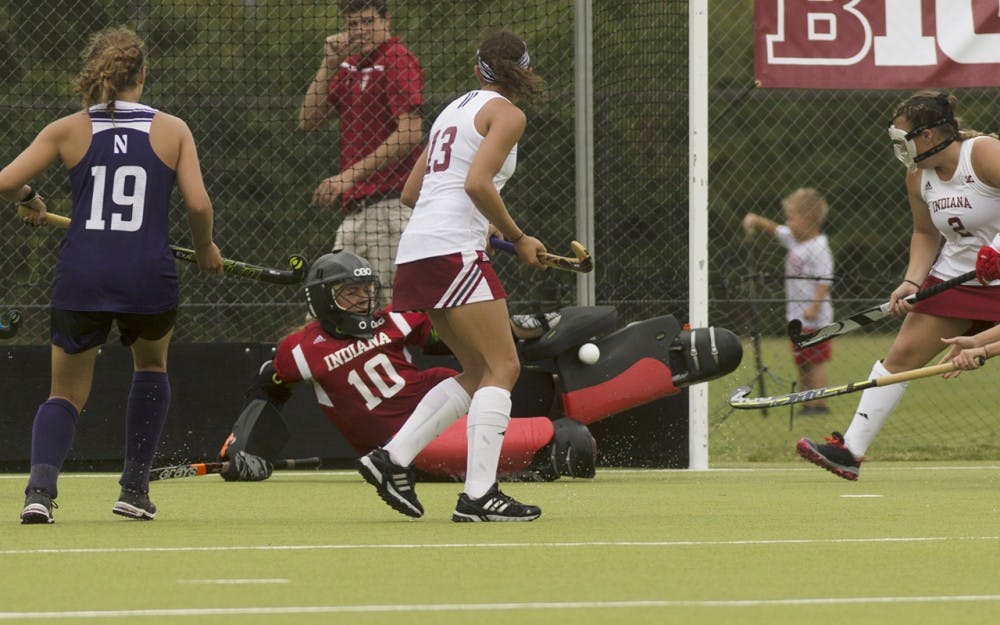 Then-freshman goalkeeper Noëlle Rother blocks a shot on goal during a game against Northwestern at the IU Field Hockey Complex on Spet. 27, 2015.