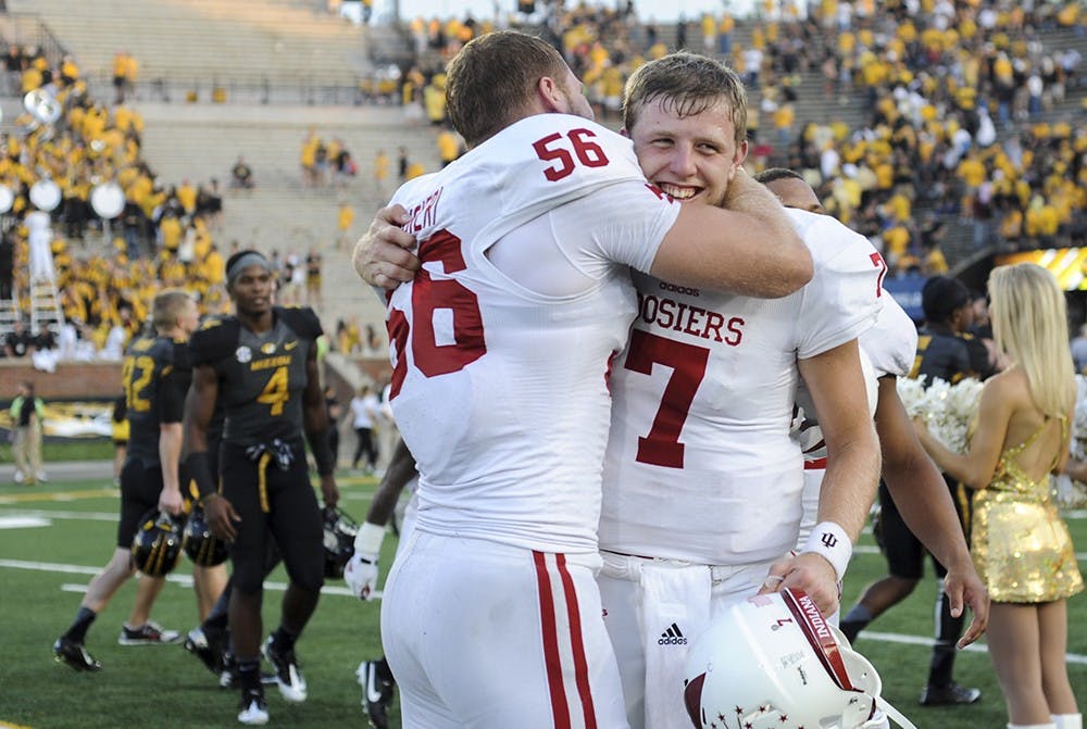 Junior defensive end Nick Mangieri, left, and junior quarterback Nate Sudfeld celebrate after beating Missouri, 31-27, on Saturday at Faurot Field in Columbia, Mo.