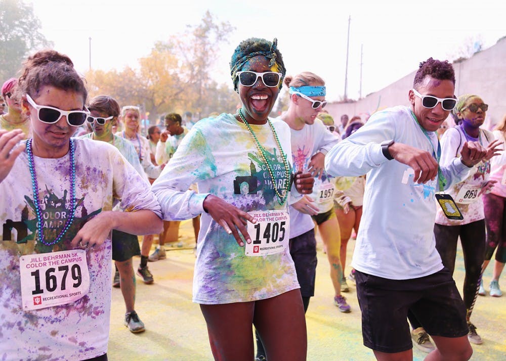 Participants in this year's JB5K Color Run dance at the post-run party. The dance took place on Saturday in front of Student Recreational Sports Center.&nbsp;