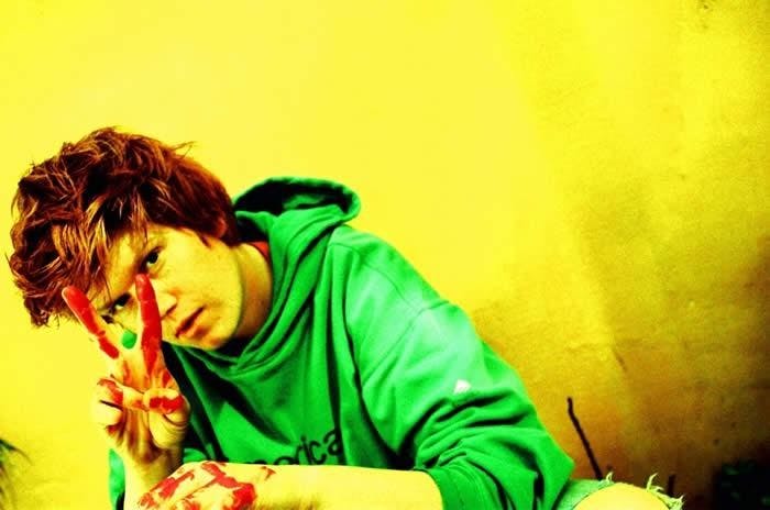 Brett Dennen gestures the number of songs on his album that aren’t too sappy to tolerate.