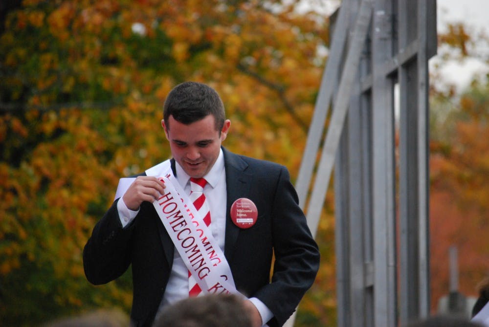 Senior Matt Renie walks off stage after being announced as Homecoming King.