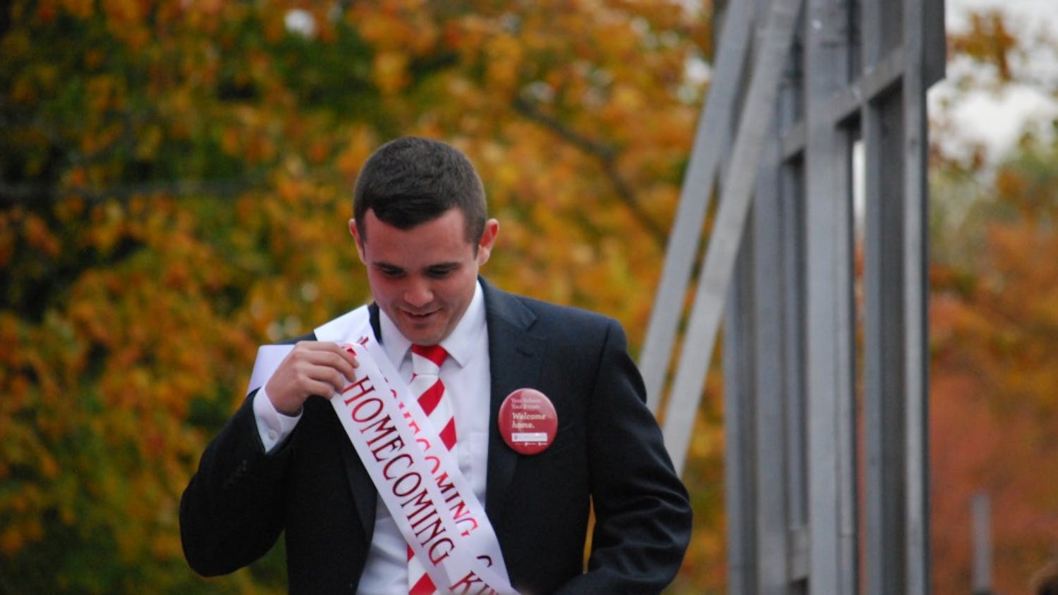 Senior Matt Renie walks off stage after being announced as Homecoming King.