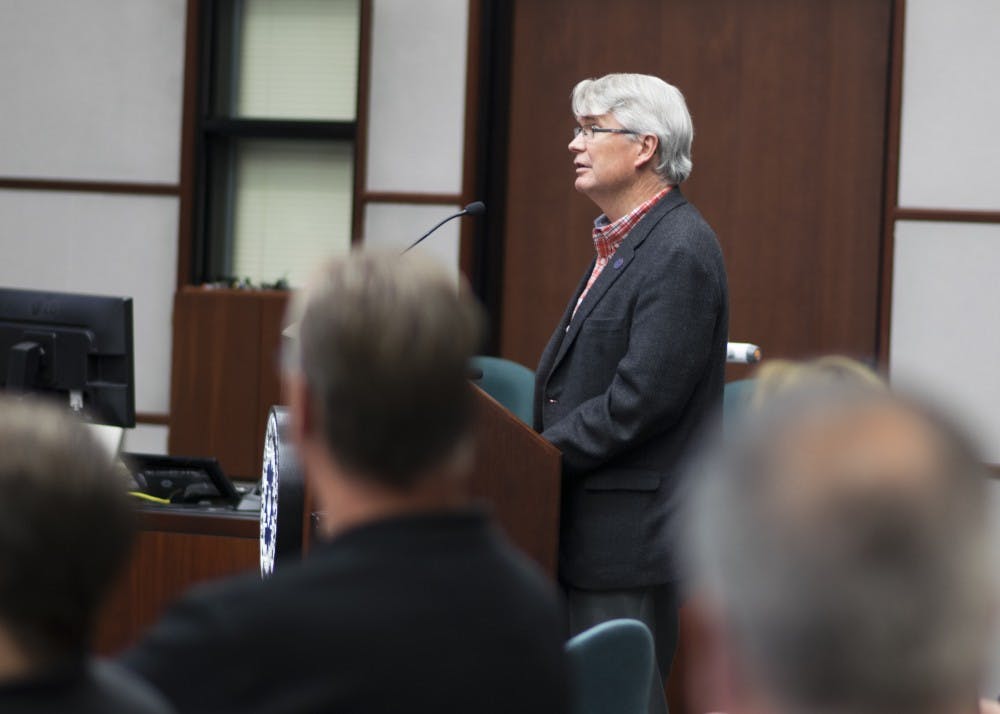 Mayor John Hamilton speaks at the city council meeting Oct. 4 evening to endorse Ordinance 17-39, which authorized an agreement between the City of Bloomington and Cook Medical. The Bloomington City Council voted Wednesday night to approve a deal made with Cook Group Inc. which would allow the Bloomington-based company to pay the city fees in exchange for not being annexed into the city limits.