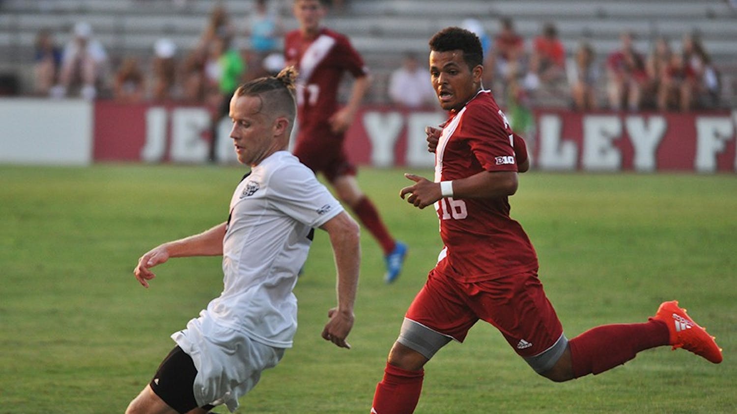 Sophomore midfielder Rees Wedderburn chases down an Oakland player during IU's exhibition game last Thursday.