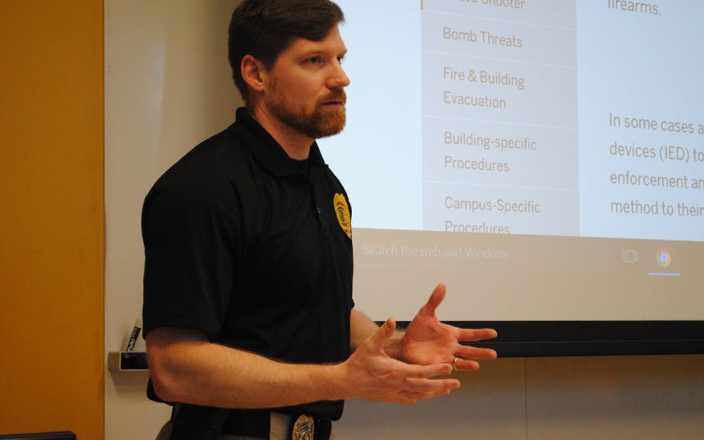 Lieutenant Brice Teter of the IUPD educates graduate students on proper response to an active shooter situation. Teter met with students Tuesday evening in the Global and International Studies Building.