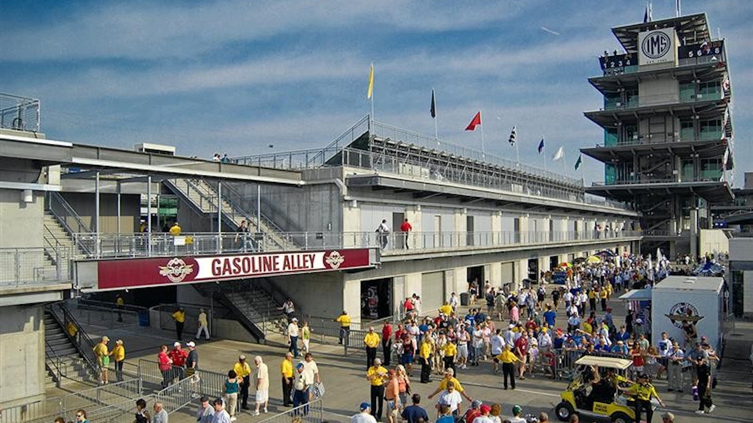 Fans walk along Gasoline Alley prior to the start of Sunday's Indy 500 at Indianapolis Motor Speedway.