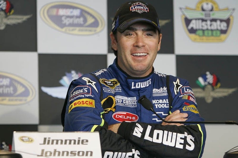 Jimmie Johnson, driver of the No. 48 Lowes Chevrolet, answers media questions after winning the pole position for Sunday's Brickyard 400. Johnson turned a lap of 181.763 m.p.h covering the 2.5 mile speedway in 49.515 seconds.