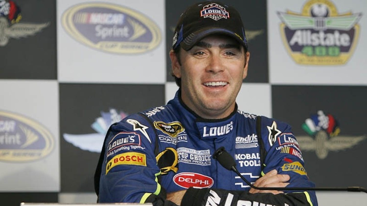 Jimmie Johnson, driver of the No. 48 Lowes Chevrolet, answers media questions after winning the pole position for Sunday's Brickyard 400. Johnson turned a lap of 181.763 m.p.h covering the 2.5 mile speedway in 49.515 seconds.