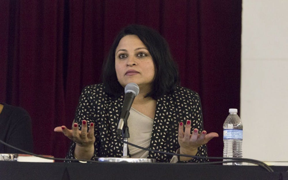 Scholar Activist Deepa Iyer answers questions Monday evening in the IMU Frangipani Room during the Asian American Studies Department event Rising Up.