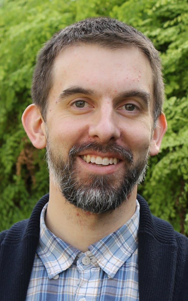 Assistant professor of Biology James McKinlay is conducting research on the relationship of microbes to understand how they can benefit society. McKinlay was one of five people to receive IU's Outstanding Junior Faculty for 2016-2017 award.