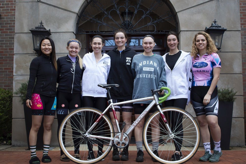 <p>Delta Gamma bike team members stand March 22 in front of their house. Delta Gamma has intensified its training this year to prepare for the 2019 Little 500 race.</p>