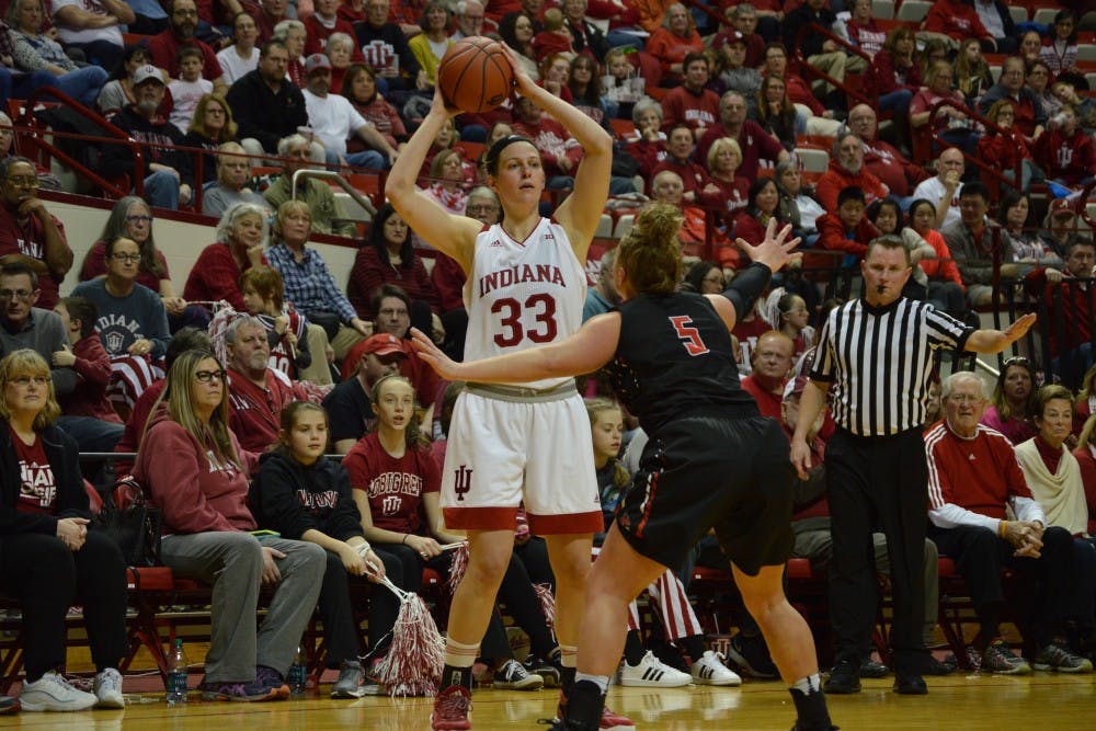 Junior forward Amanda Cahill looks to her teammates to pass the ball during their game against Ball State Thursday evening. The Hoosiers beat Ball State 71-58 advancing to the second round of the NIT which they will play Sunday afternoon.&nbsp;&nbsp;