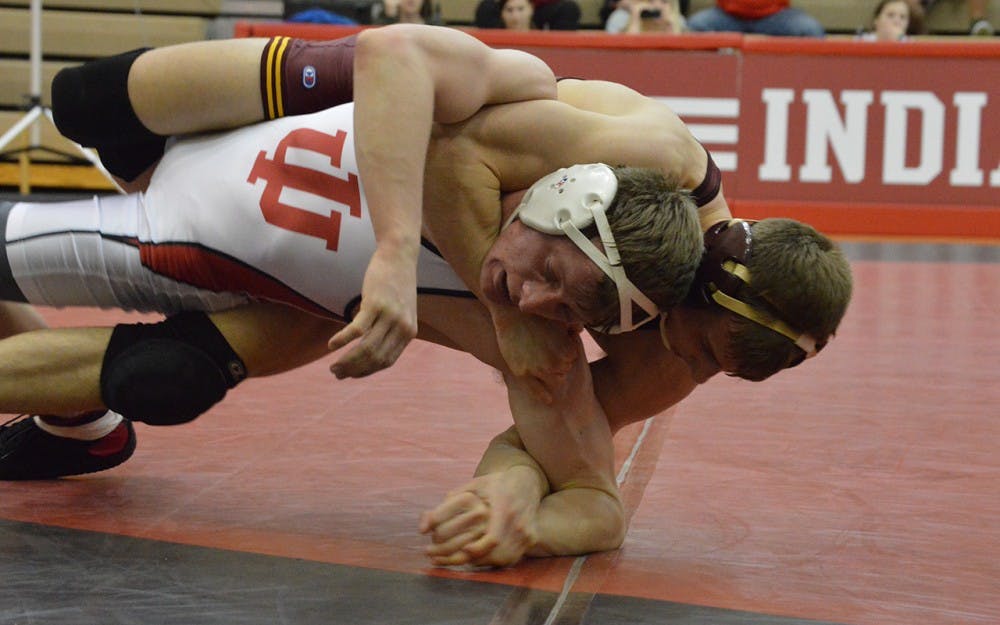 Sophomore Jake&nbsp;Danishek attempts to escape from a takedown during the Hoosiers' match against Minnesota in January. Danishek picked up a win in IU's victory over No. 20 Appalachian State on Sunday.