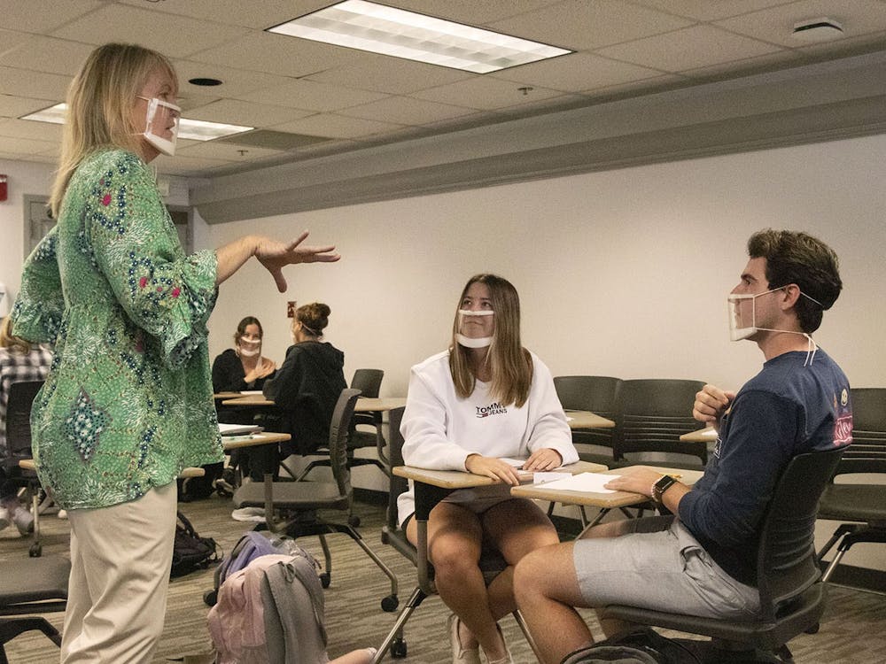 IU professor Debbie Gessinger helps students in her American Sign Language class Oct. 20, 2021, at Lindley Hall. Gessinger also teaches ASL classes on Zoom. 