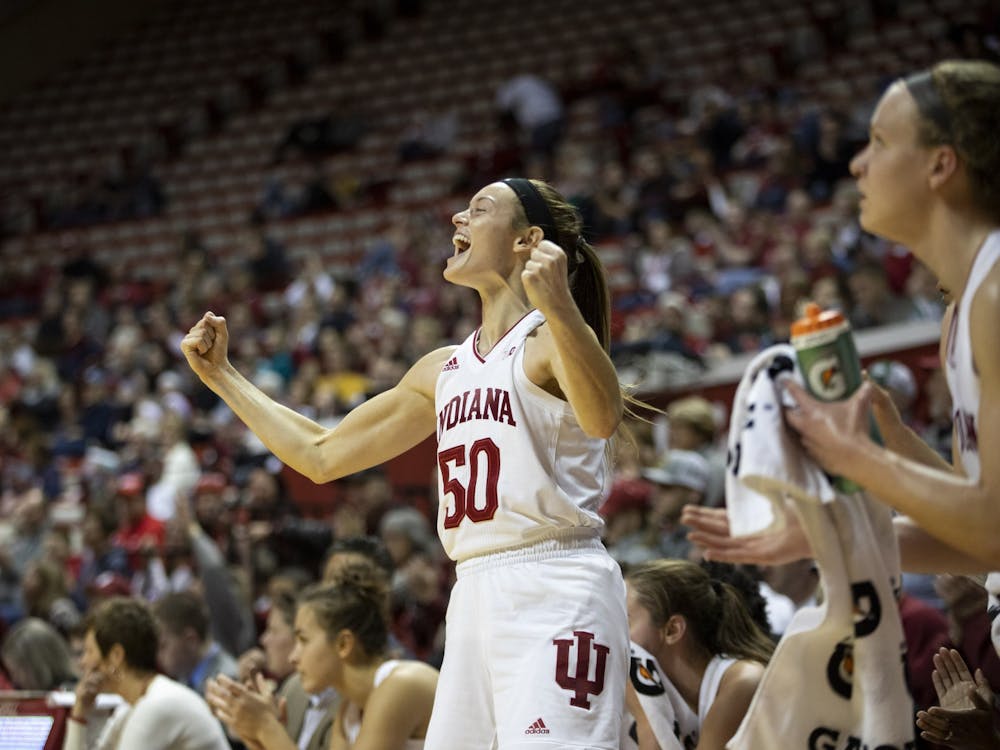 Then-senior Brenna Wise celebrates on the sideline Dec. 15, 2019, in Simon Skjodt Assembly Hall. Wise recorded 1,421 points and 849 rebounds over the course of her career at IU.