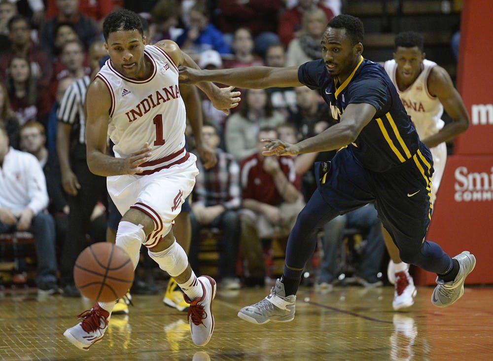 Freshman James Blackmon Jr. steals the ball from North Carolina Greensboro's Asad Lamont on Friday at Assembly Hall. IU won 87-79.