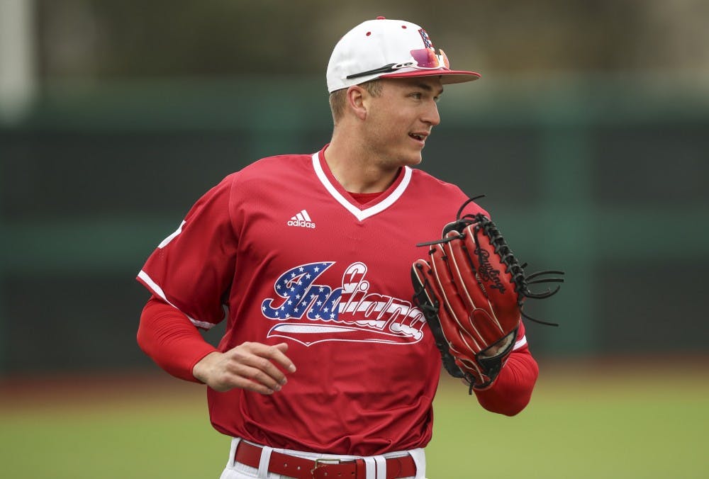<p>Junior Matt Gorski runs back to the dugout during the Hoosiers' game against the Indiana State Sycamores on April 10. The Hoosiers began fall season play on Saturday against the Louisville Cardinals.</p>