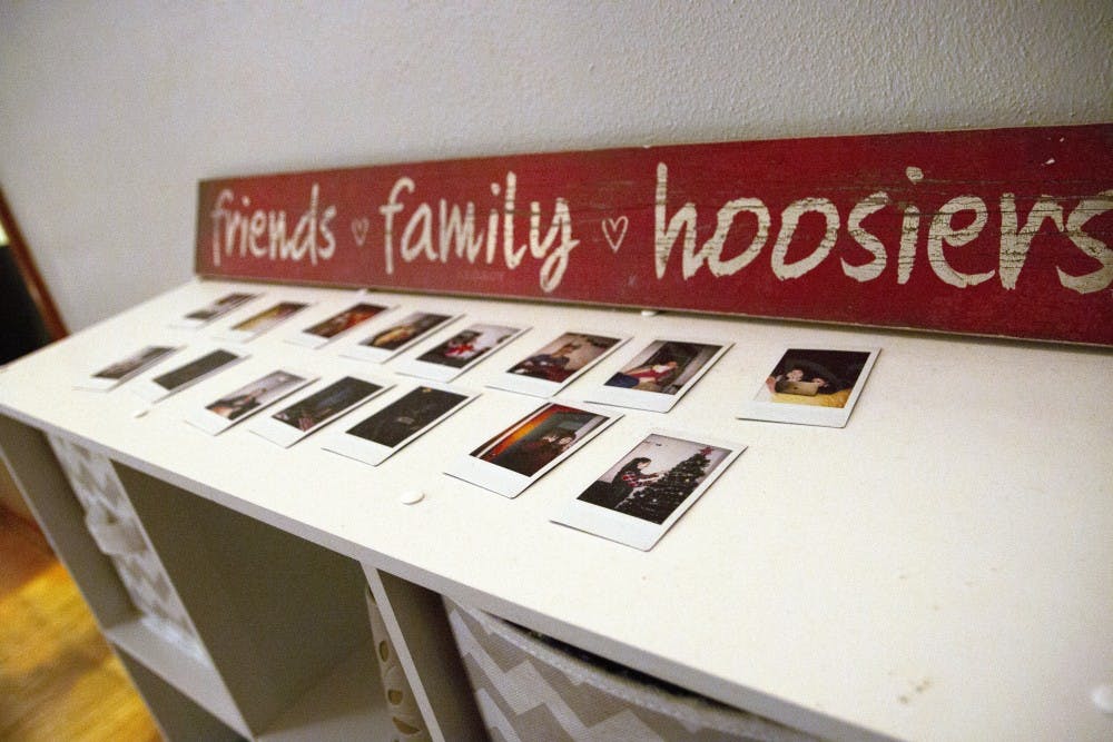 <p>As Polaroid pictures come back into style, students often display them around their rooms, hung up on string lights or set on tabletops.&nbsp;</p>