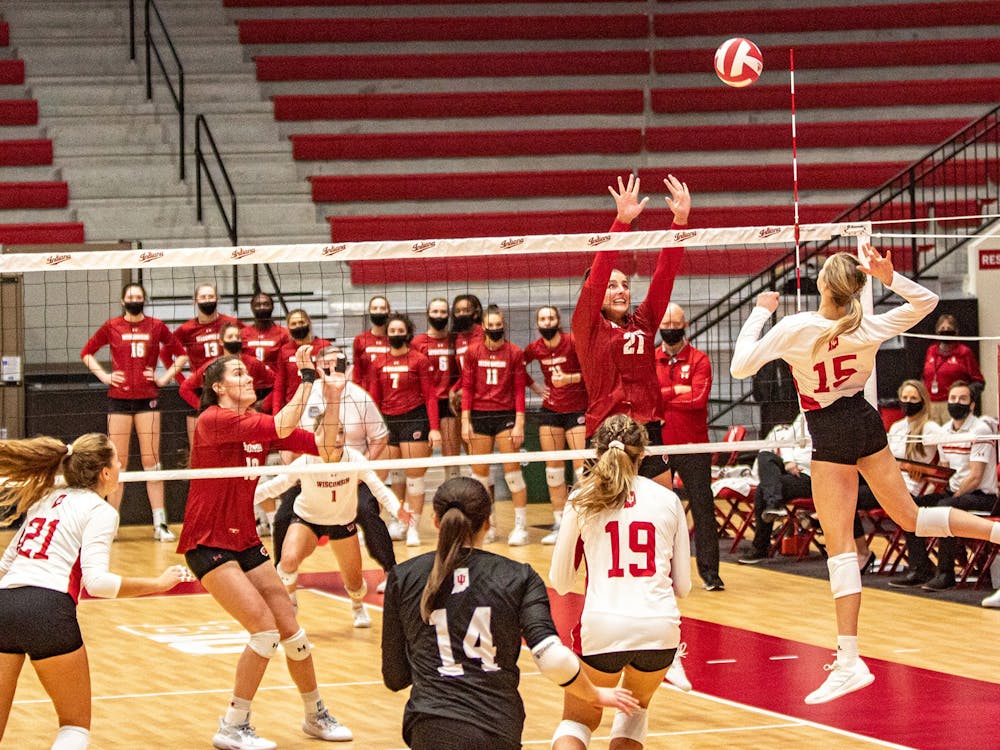 Then-freshman middle blocker Savannah Kjolhede spikes the ball Feb. 12, 2021, in Wilkinson Hall. Indiana volleyball will return to Bloomington to face the Iowa for its first home conference match 7 p.m. Wednesday. 