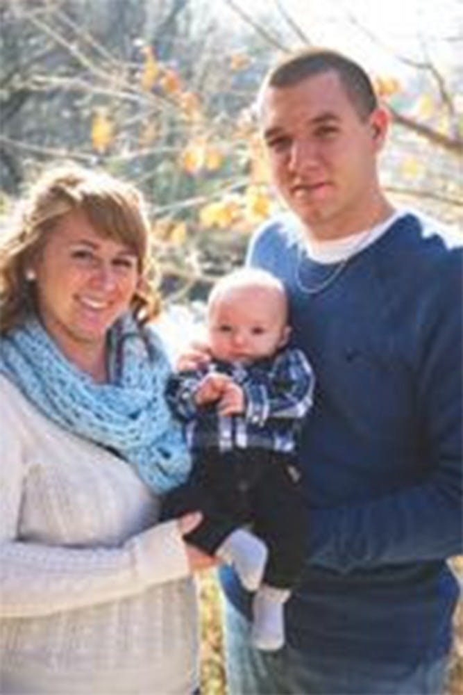 Howard County Deputy Carl Koontz and family. Koontz died this afternoon of wounds sustained early this morning.