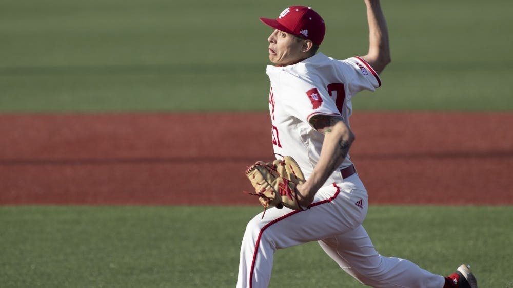 Then-freshman right-handed pitcher Gabe Bierman pitches the ball March 27 at Bart Kaufman Field. The University of San Diego defeated IU 5-13 March 8.﻿﻿