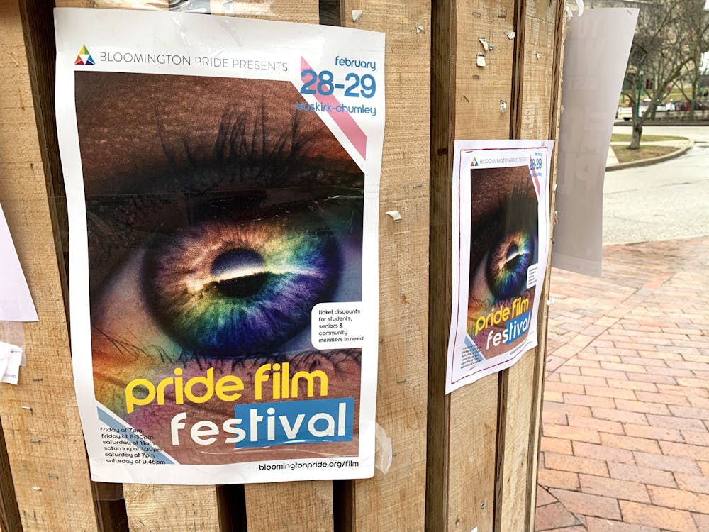 Posters for the 18th Pride Film Festival hang on a pole Feb. 24 outside Sycamore Hall. The festival will be Feb. 28-29 at the Buskirk-Chumley Theater.