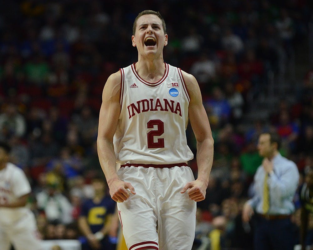 Redshirt senior Nick Zeisloft celebrates during the NCAA Tournament game against Chattanooga on Thursday at the Wells Fargo Arena in Des Moines, Iowa. The Hoosiers won 99-74.