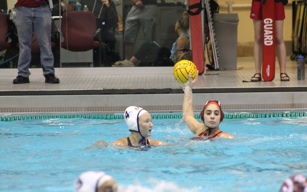 Freshman Joelle Nacouzi looks to pass the ball as Abi Auer of California Baptist University. Nacouzi scored three goals and had 3 assists in Saturday's match up with the Lancers.