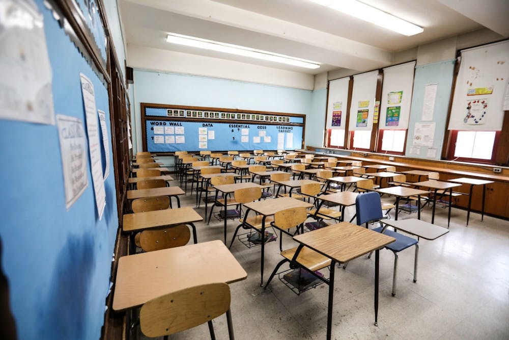 An empty middle school classroom is pictured. In contrast to statewide data, IU says the majority of their education graduates go on to teach.