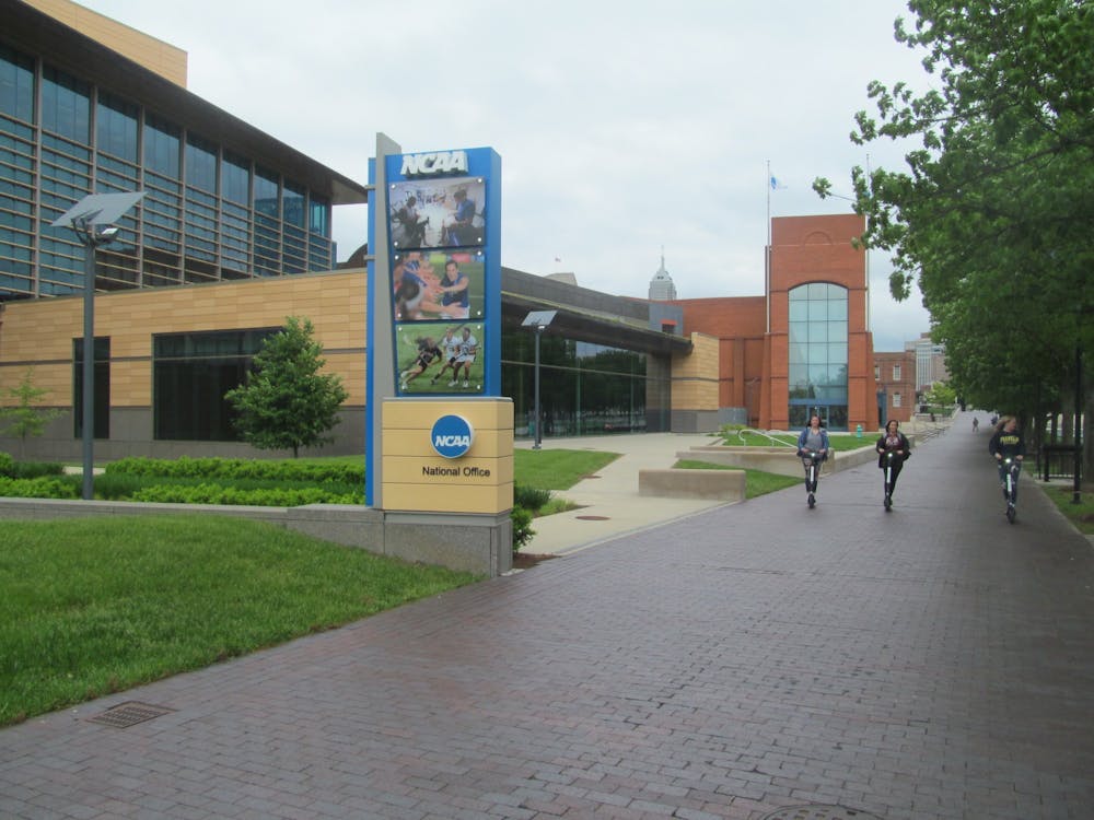 <p>The headquarters of the NCAA in Indianapolis. The NCAA adopted an interim set of rules Wednesday, which will allow collegiate athletes to earn money for their Name, Image and Likeness.</p><p><br/><br/><br/></p>