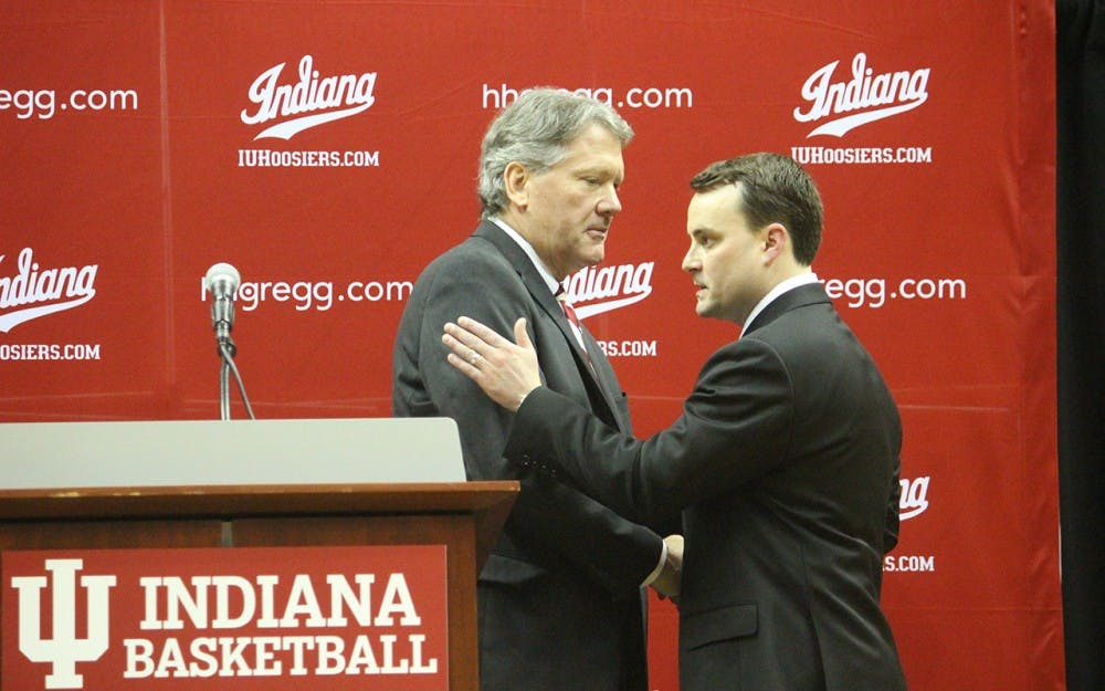 IU Coach Archie Miller and IU Athletics Director Fred Glass shake hands after the press conference to announce Miller's hiring.