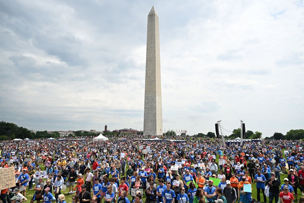 Thousands of gun control advocates join the "March for Our Lives" as they protest against gun violence during a rally June 11, 2022 near the Washington Monument on the National Mall in Washington, D.C. A Bloomington man was charged with trespassing, tampering and vandalism Tuesday night after he was said to have vandalized the monument with red paint.