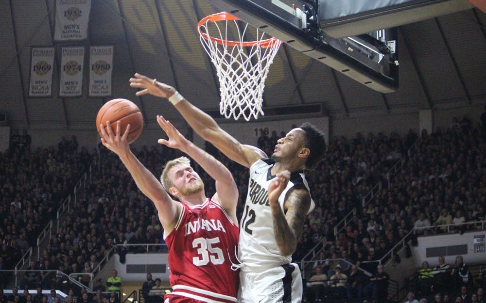 IU junior forward Tim Priller takes the ball to the rim in the second half of the game against Purdue on Tuesday evening. Priller played five minutes and scored six points, and could see more time at Ohio State on Saturday.