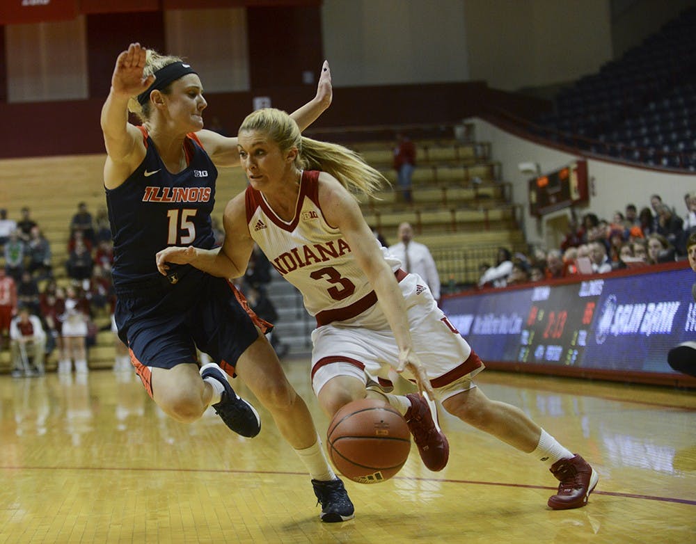 Sophomore guard Tyra Buss drives towards the basket during the game against Illinois on Wednesday at Assembly Hall. The Hoosiers won, 68-66.